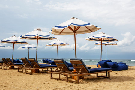 Empty loungers without tourists on the beach