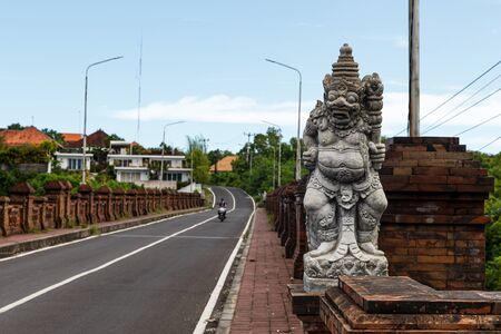 Bali religion sculpture near the roadの写真素材