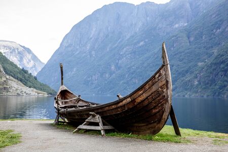 Viking boat at natural fjord at Norwayの写真素材