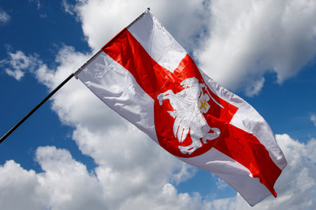 Minsk, Belarus - 23.08.20: Flag with historical Belarus emblem. Coat of arms of Belarus.のeditorial素材