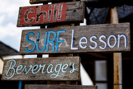 Plates with different offers services on the beachの写真素材