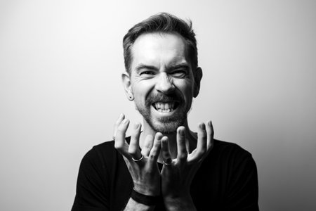 Portrait of a mad man. Black and whiteの写真素材