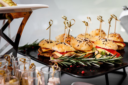 Close-up burgers at catering event.の写真素材