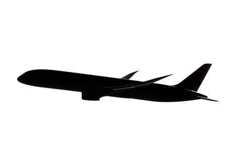 Black silhouette of an airplane on isolated white backfroundの写真素材