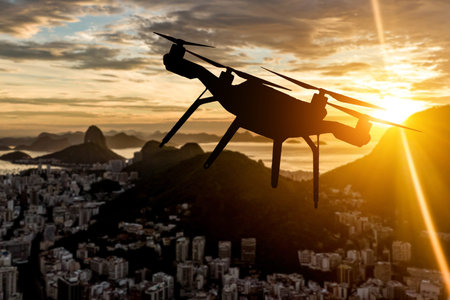 Drone silhouette flying above Rio de Janeiro cityの写真素材