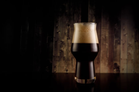 Dark craft beer in the old bar.の写真素材