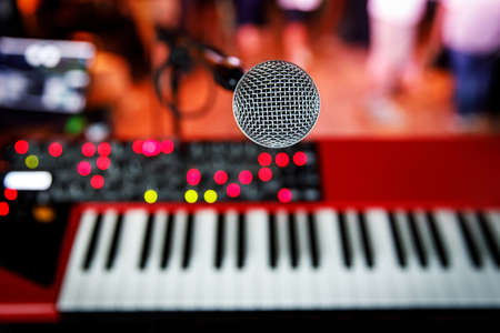 Microphone and keys during the concert. View from the stage.の写真素材