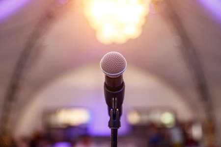 Microphone on stage against a background of the hall.の写真素材