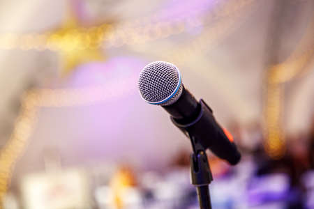Microphone on stage against a background of the hall.の写真素材
