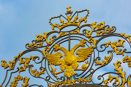 Russian double-headed golden eagle against the blue skyの写真素材