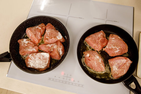 Turkey fillet fried in a pan