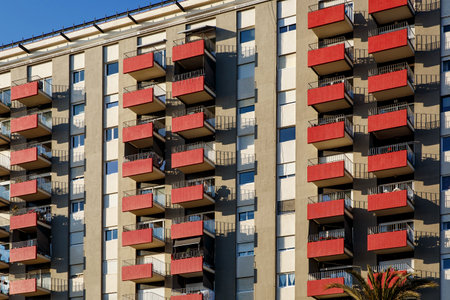Facade of a house with red balconiesの写真素材