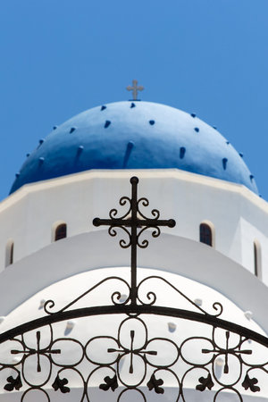 Classic greek white church with blue domeの写真素材