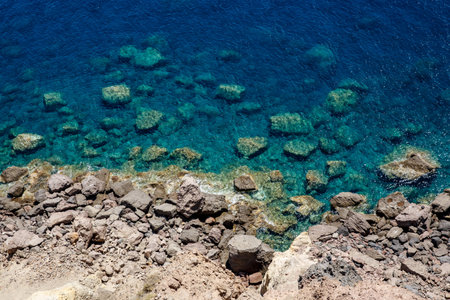 Stones at the bottom of the blue ocean