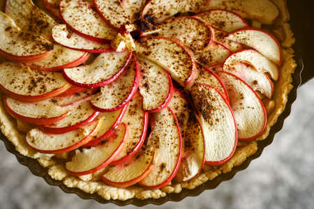 Pieces of apple with cinnamon, close up of open apple pieの写真素材