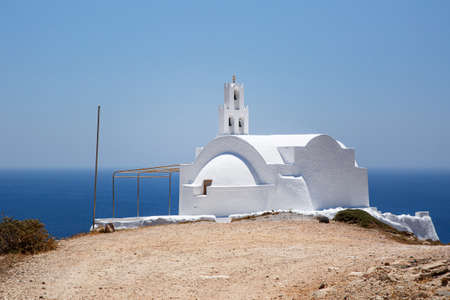 Traditional Greek white church on the seashoreの写真素材