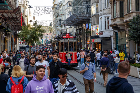 Istanbul, Turkey - April 06, 2022: Old-fashioned red tram on Istiklal Streetのeditorial素材