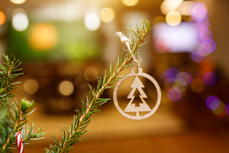 Wooden decorations on a Christmas tree - Festive lightの写真素材