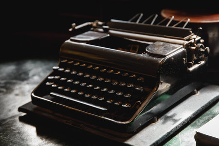 Old vintage typewriter on the desktop