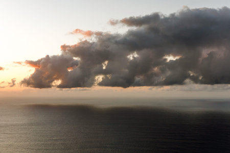 Stormy clouds over the sea during sunset