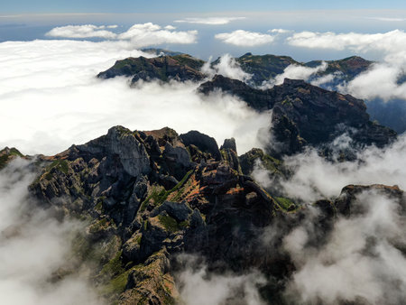 Drone view of Madeira Mountains Pico do Arieiro, Portugal. Rocky peaks over the cloudsの写真素材