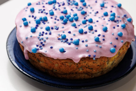 Glazed poppy easter cake with blue ...