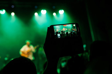 Vibrant crowd enjoying live music in an illuminated nightclub.
