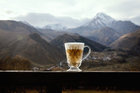 Coffee against the backdrop of a mountain valley