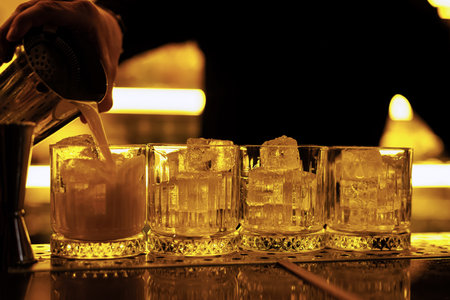 Making of whiskey sour cocktail.