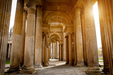Ancient Roman colonnade with columns and arch