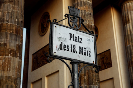 Street sign of the famous Platz des 18. Marz (March 18th Square) near the Brandenburg Gate in Berlinの写真素材