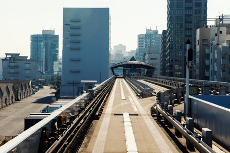 A Stunning Urban Monorail Track Set Against a Modern Cityscape.の写真素材