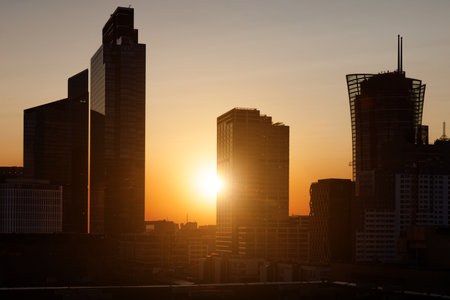 Dawn over the skyscrapers of the city business center.の写真素材