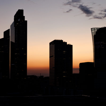 The Urban Silhouette at Dusk Exploring the Captivating Beauty of a Cityscape at twilightの写真素材