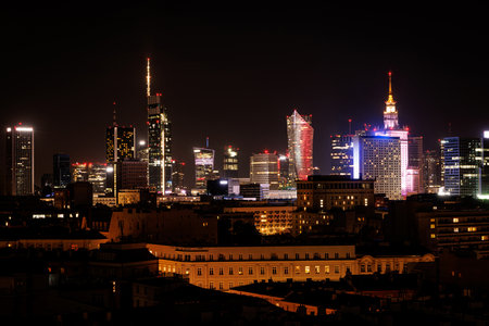 Illuminated skyscrapers in the business center of a big city.の写真素材