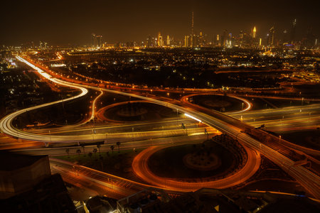 A large interchange in Dubai. An illuminated highway in a big cityの写真素材