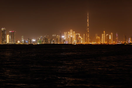 Panoramic view of a big futuristic Dubai city by night, United Arab Emirates. Nighttime skylineの写真素材