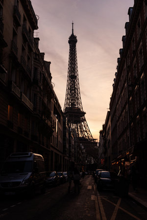 Paris street at sunset, Eiffel Tower in the backgroundの写真素材