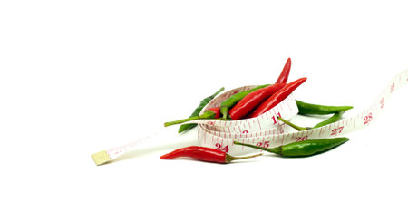 red and green thai chili in diet conceptの写真素材
