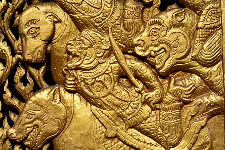 Native Thai style wood carving in the templeの写真素材