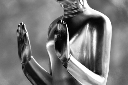 Buddha statue standing composed の写真素材
