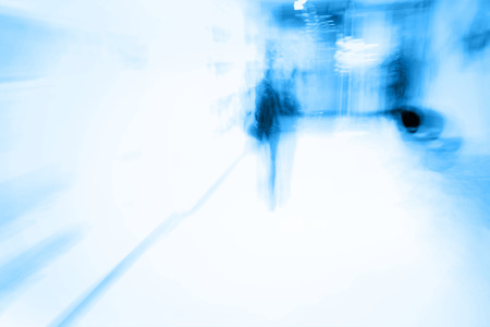 City in movement, Abstract blurry background in blue tonesの写真素材