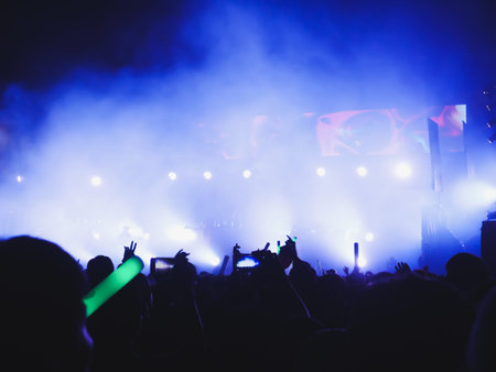 Crowd people use smartphones enjoying the club party with concert, Party people enjoy of music...