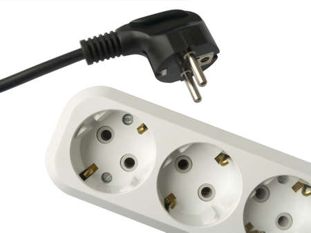 Electric plug (black) and socket (white) - isolated Electric plug (black) and socket (white) - isolated