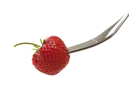 Strawberry on a forkの写真素材