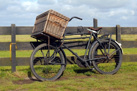 Old bike with bakery basketの写真素材