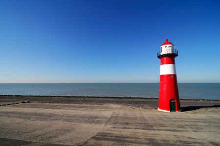 Red lighthouse in Zeeland, Netherlands