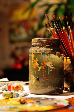 Still life of artist s brushes in sunlit studioの写真素材