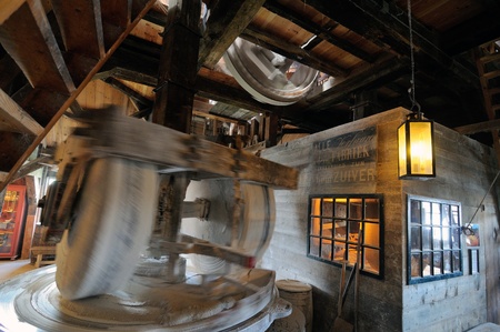 ZAANDAM, ZAANSE SCHANS - MARCH 06: interior of Jonge Schaap windmill, one of most popular dutch windmill on March 06, 2011 in the Zaandam, Zaanse Schans, Hollandのeditorial素材