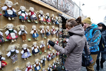 VILNIUS, LITHUANIA - MARCH 1: Unidentified people trades hand made toys in annual traditional crafts fair - Kaziuko fair on Mar 1, 2013 in Vilnius, Lithuaniaのeditorial素材